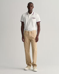 Polo de piqu&eacute; con ribete en tres colores