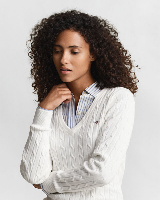 Jersey de punto de ochos con cuello de pico en algodón elástico