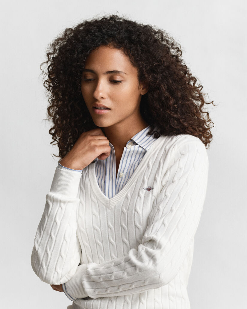 Jersey de punto de ochos con cuello de pico en algodón elástico