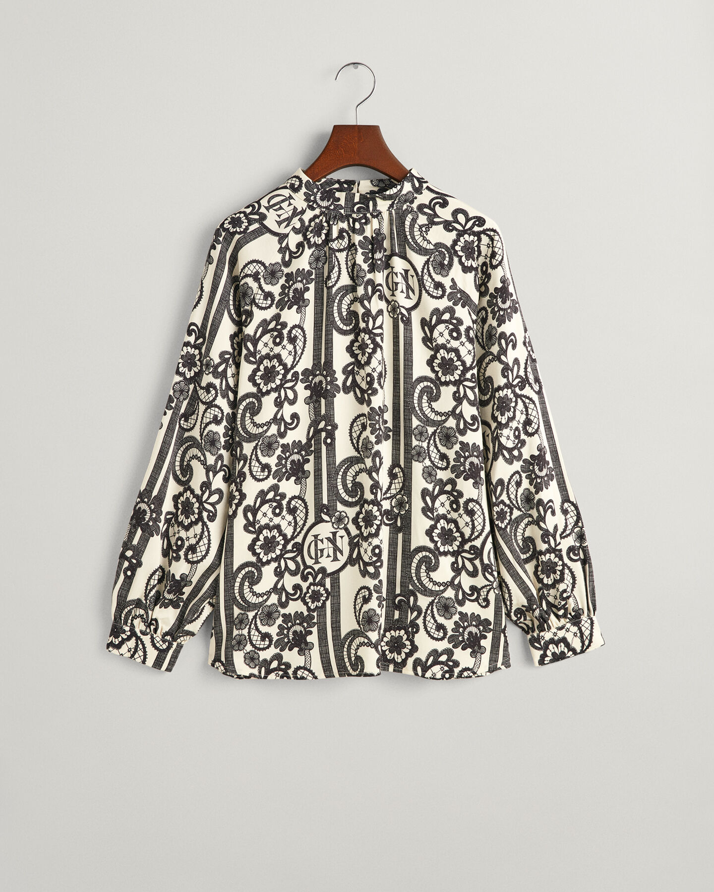 Blusa de cuello de cisne con estampado de encaje