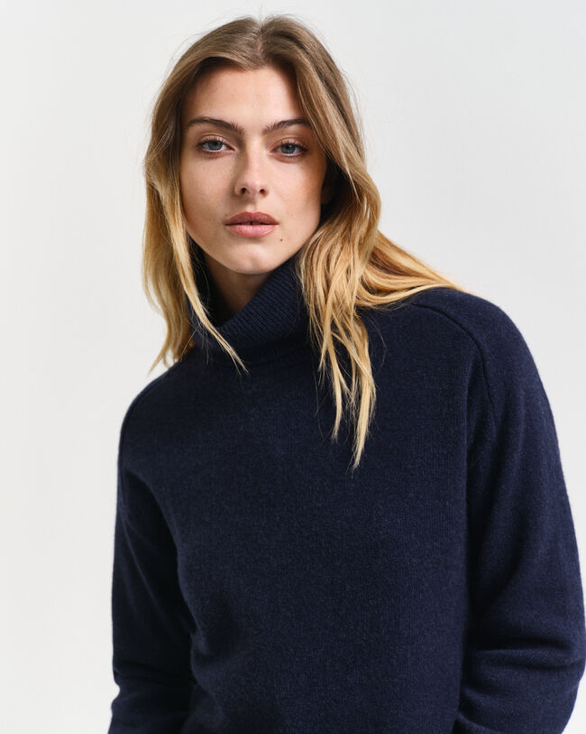 Jersey de cuello de cisne con detalle de espiga