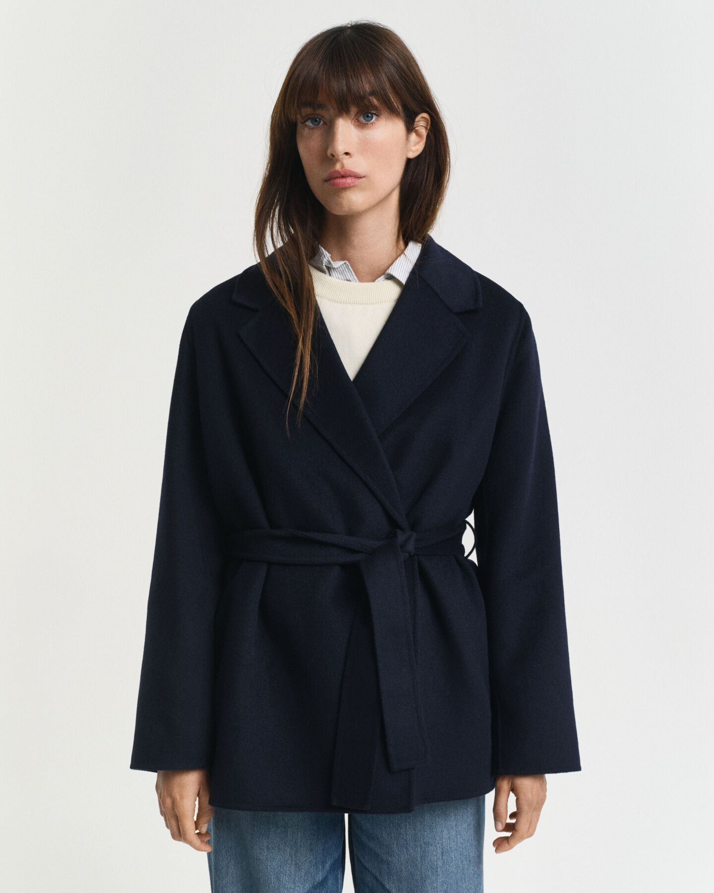 Chaqueta cosida a mano con cinturón