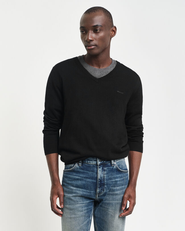 Jersey de lana merino extrafina con cuello de pico