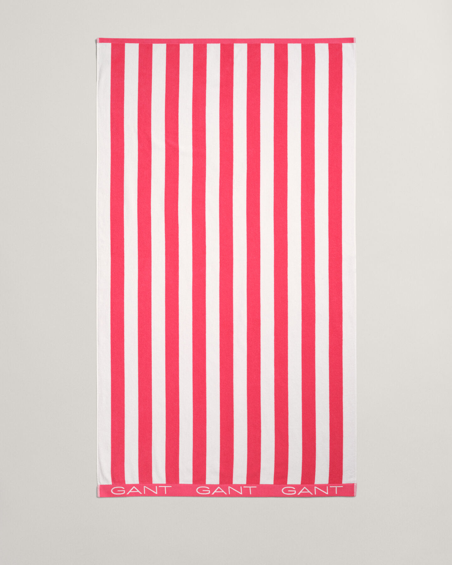 Toalla de playa de rayas en bloque