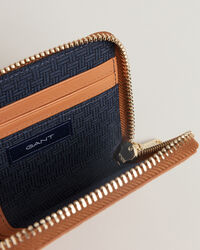 Minicartera con estampado en relieve Iconic G