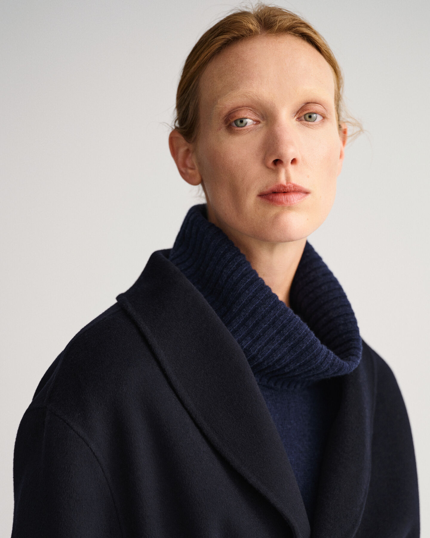 Americana cosida a mano con cinturón