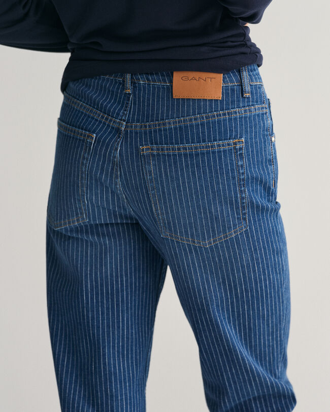 Vaqueros tobilleros de rayas con pernera recta