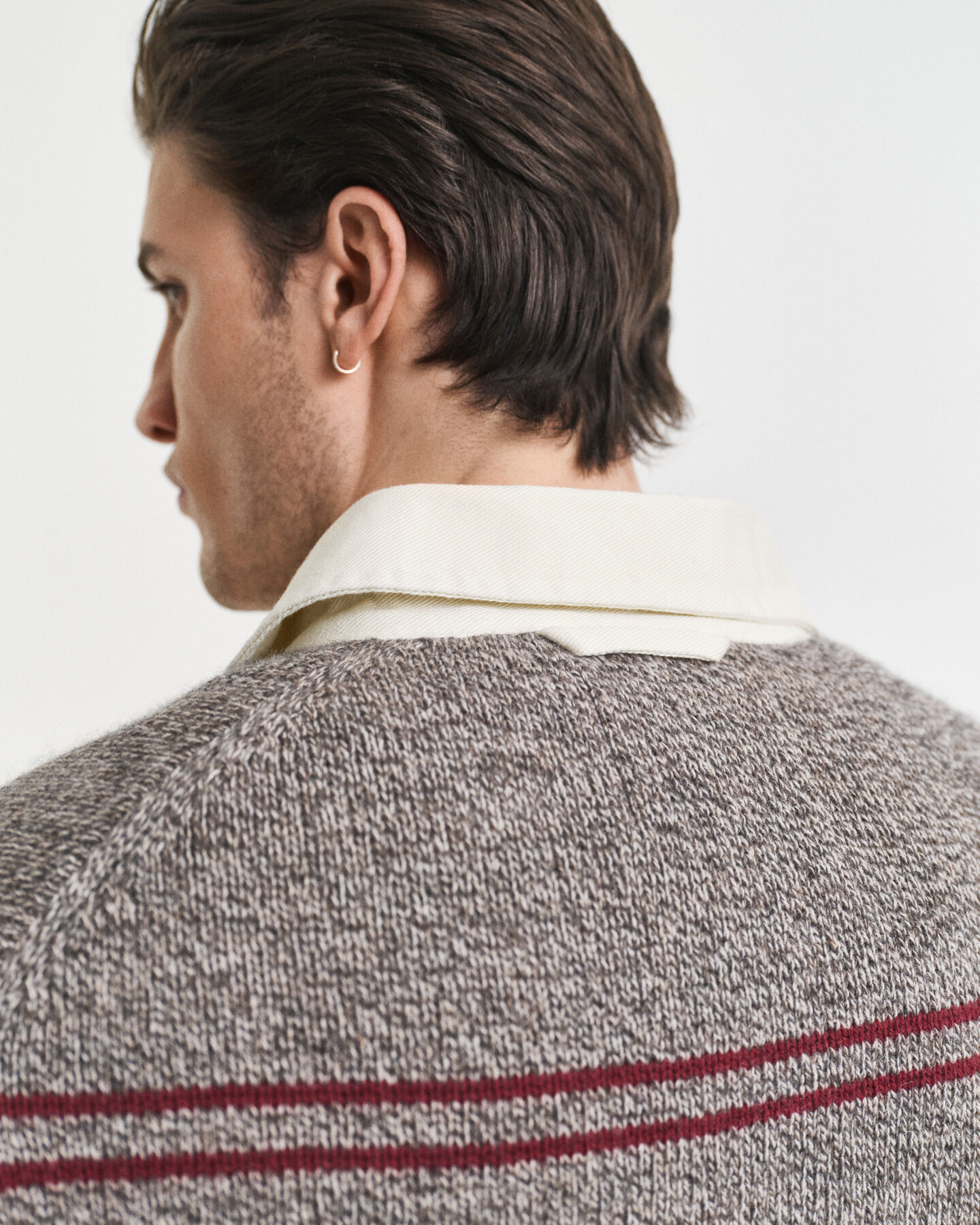 Jersey tipo polo en mezcla de lana a rayas