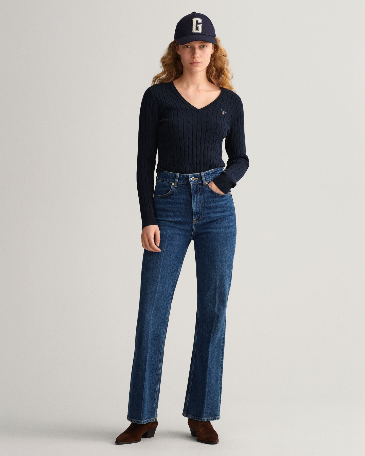 Jersey de punto de ochos con cuello de pico en algodón elástico