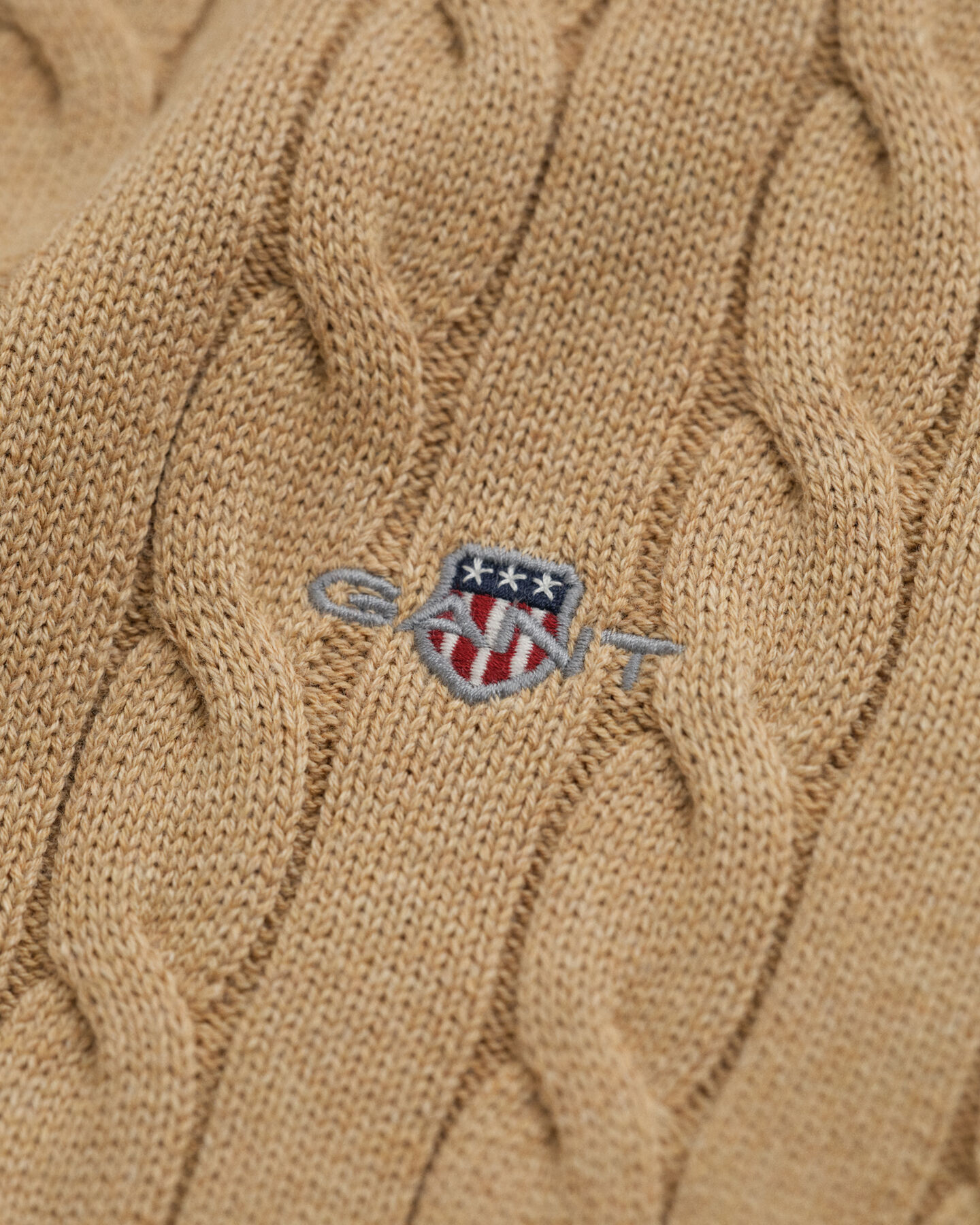 Jersey de punto de ochos de algodón con cuello de cisne