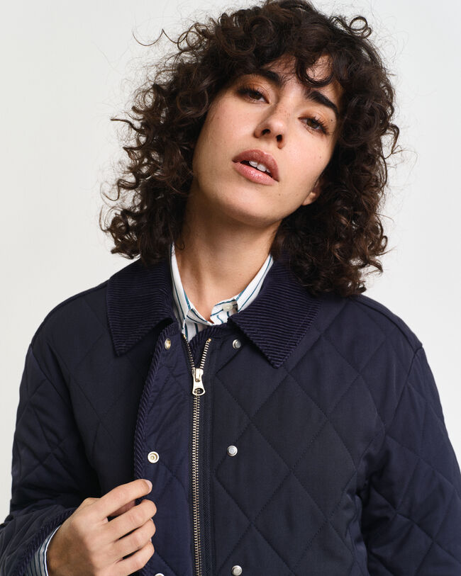 Abrigo acolchado con detalles de pana