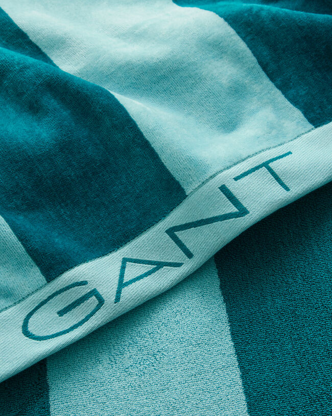 Toalla de playa de rayas gruesas