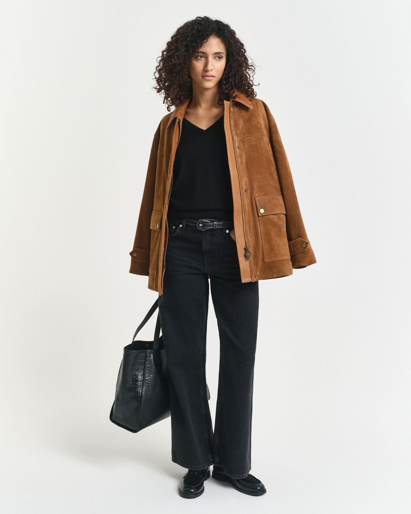 Jersey de lana merino extrafina con cuello de pico