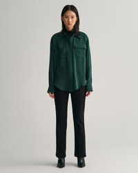 Vaqueros acampanados de color