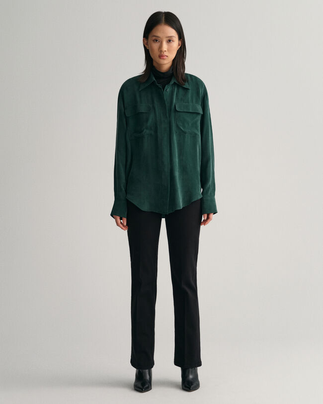 Vaqueros acampanados de color