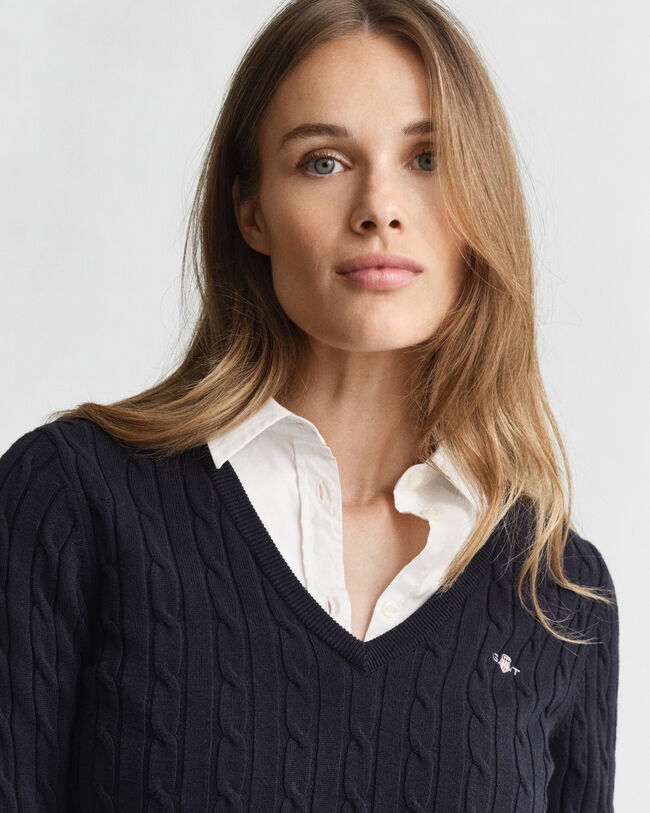 Jersey de punto de ochos con cuello de pico en algodón elástico