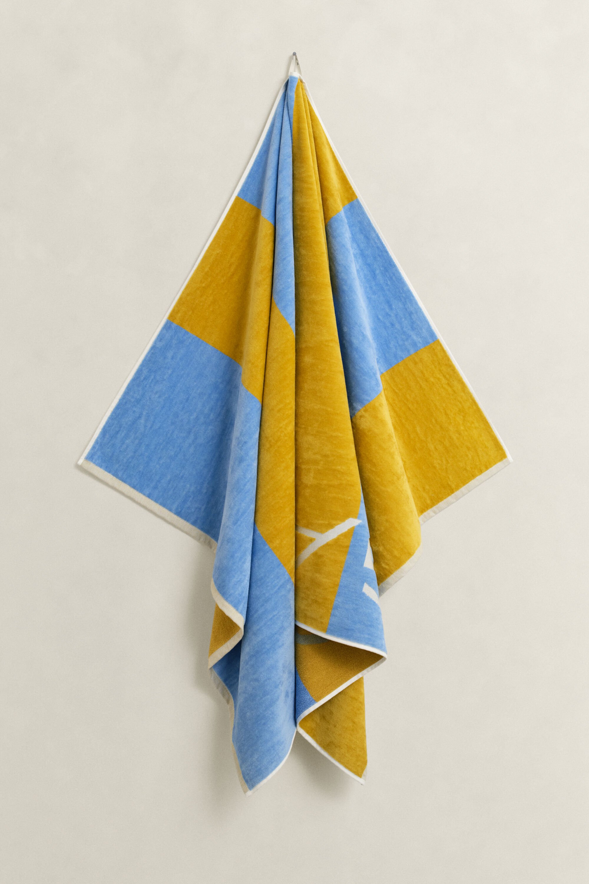 Toalla de playa de rayas en bloque