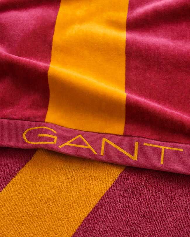 Toalla de playa de rayas gruesas