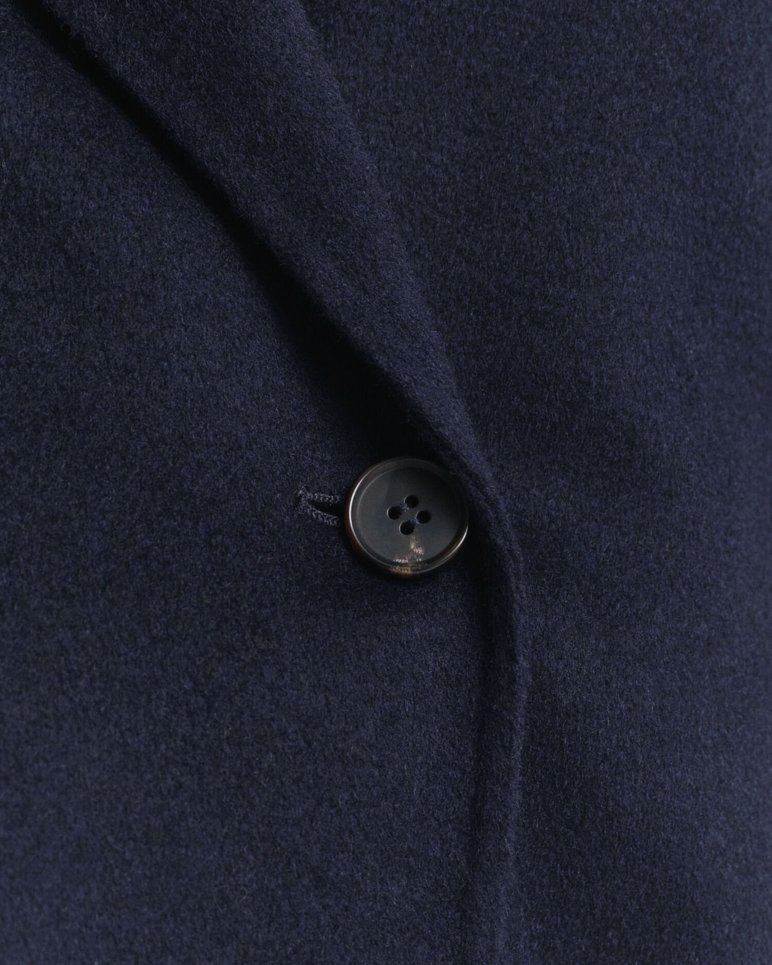 Chaqueta cosida a mano con cinturón