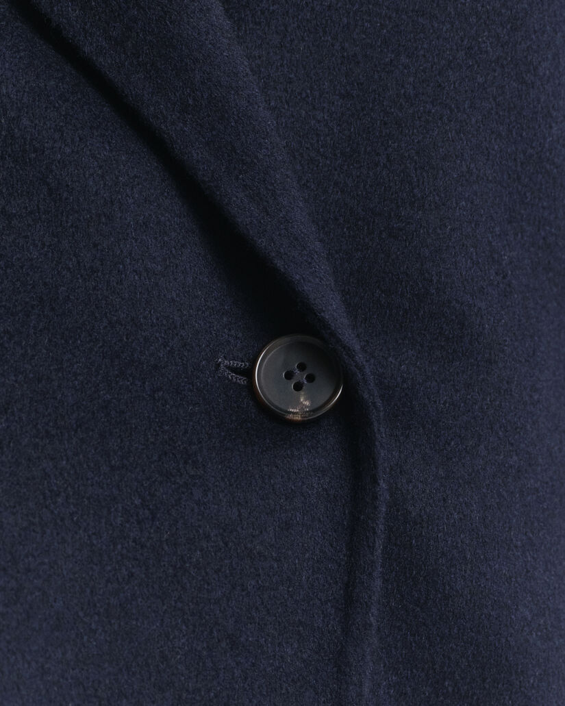 Chaqueta cosida a mano con cinturón