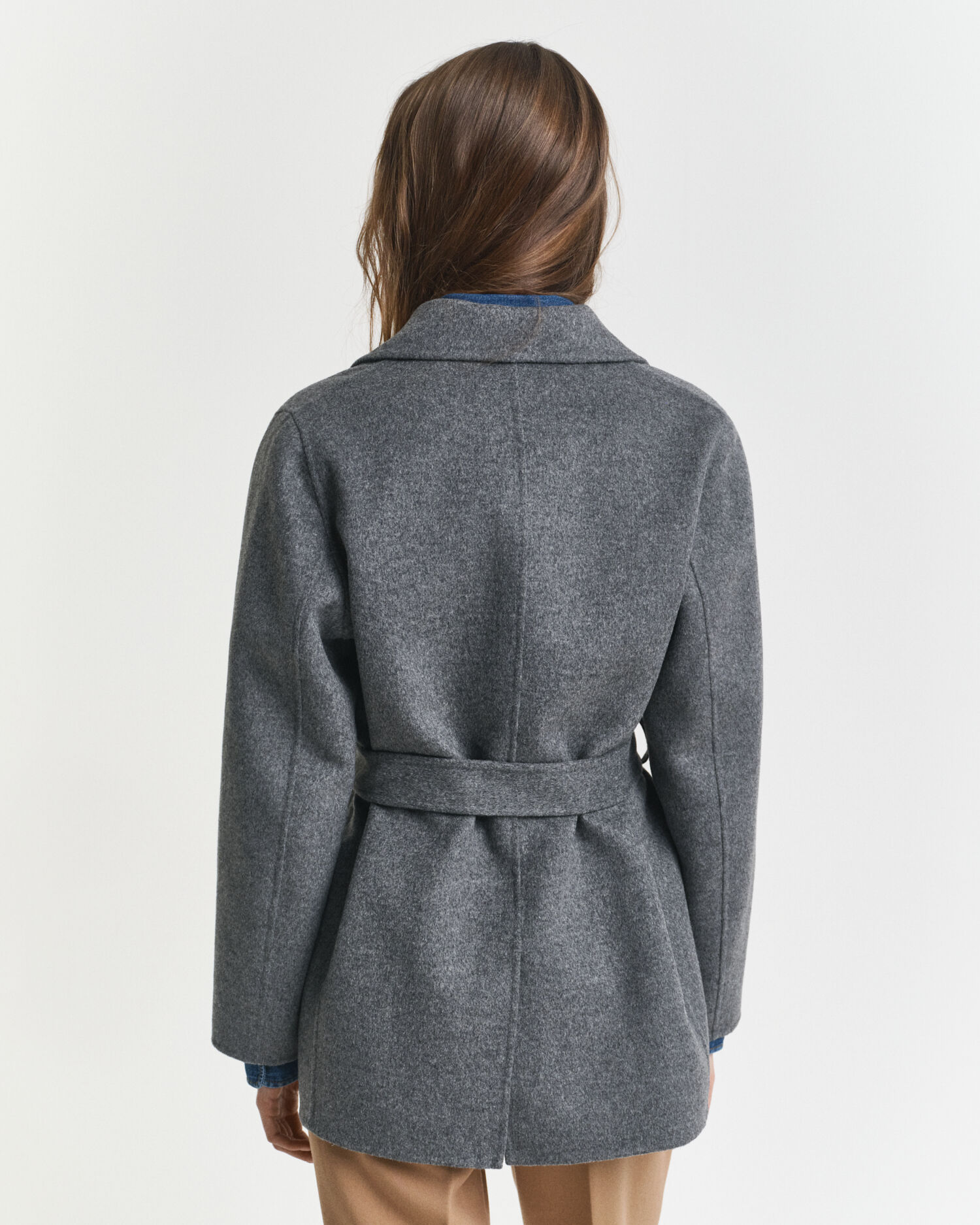 Chaqueta cosida a mano con cinturón