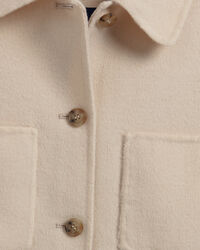 Sobrecamisa cosida a mano