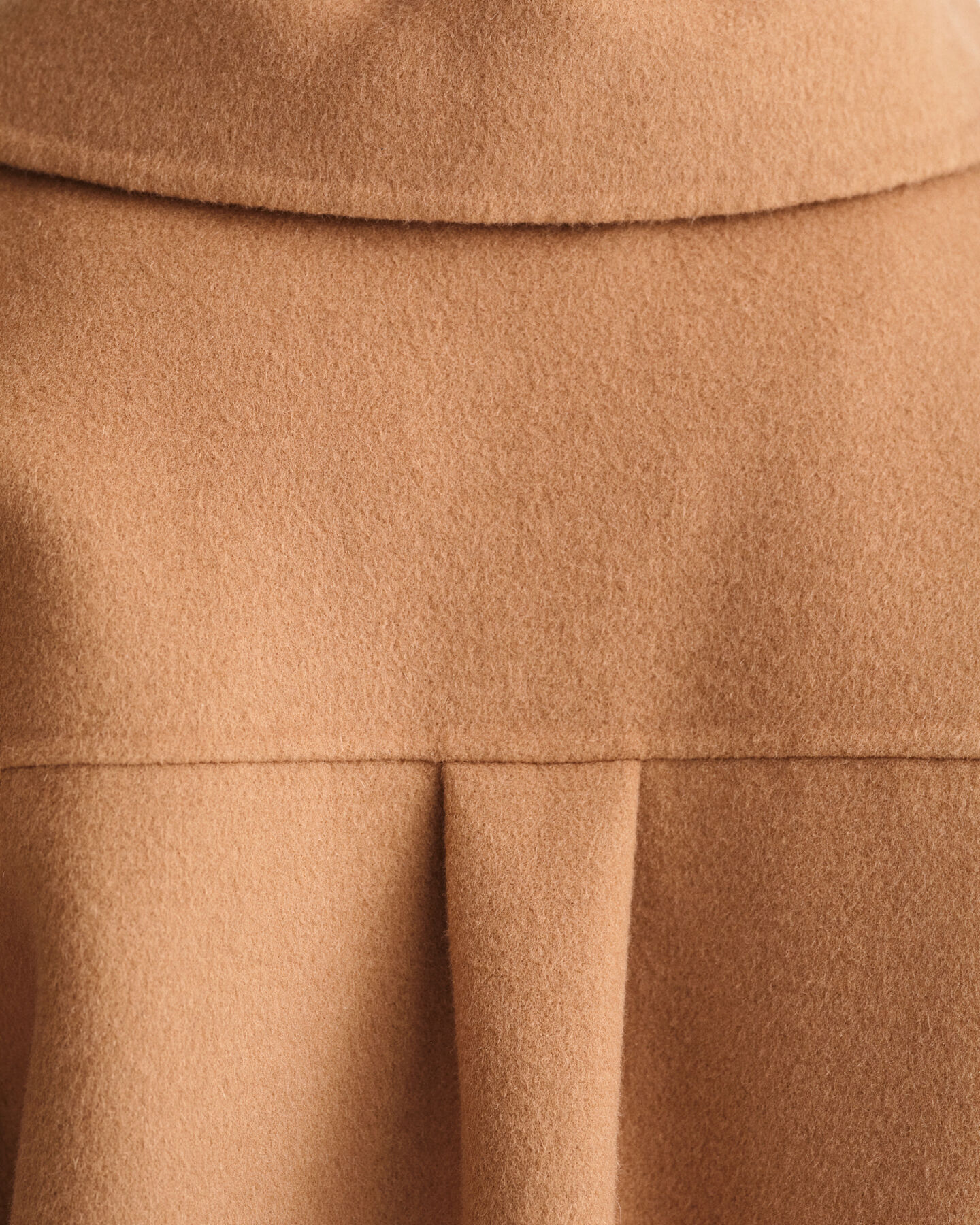 Sobrecamisa cosida a mano