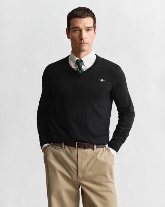 Jersey clásico de algodón con cuello de pico