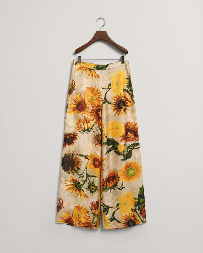 Pantalones de seda y pernera ancha con estampado de girasoles