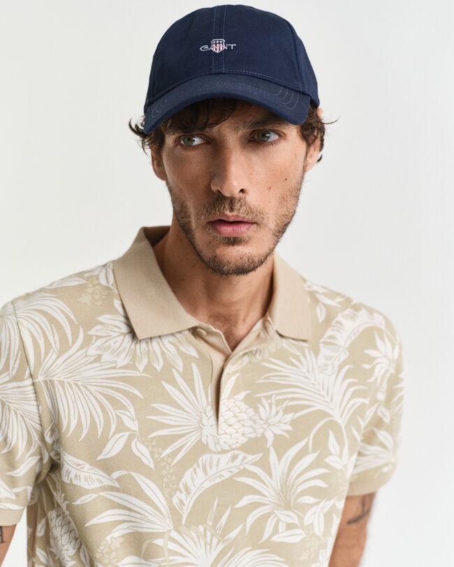 Polo con estampado tropical