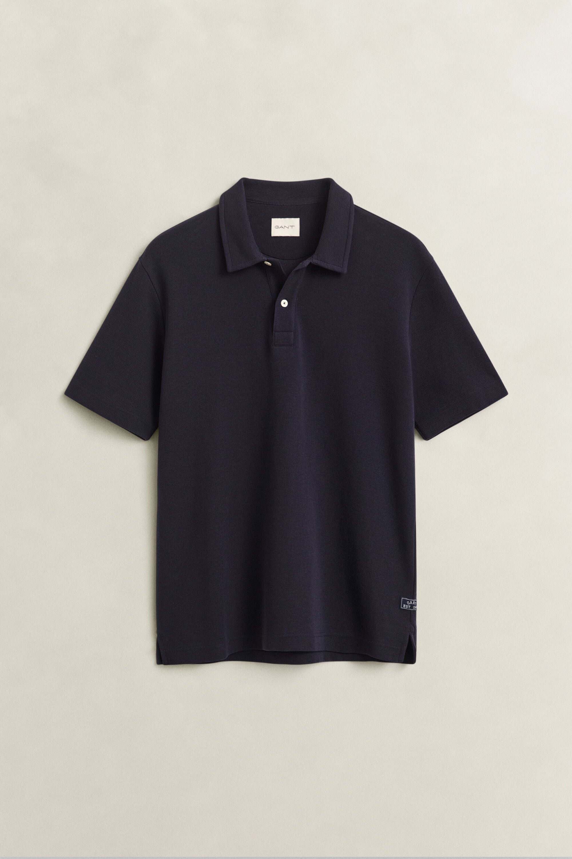 Polo con textura de nido de abeja