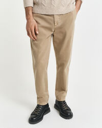 Pantalones chinos Regular Fit de tejido excedente ajustados en el bajo