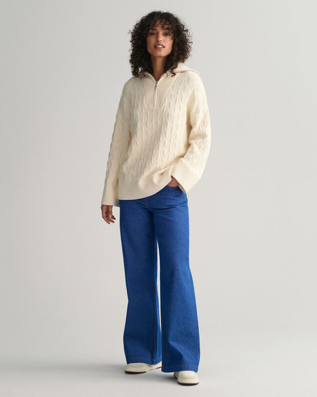 Jersey con media cremallera y diseño de espiga